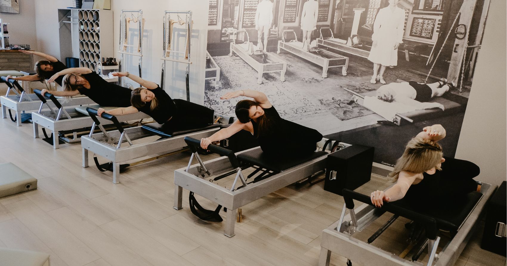 Pilates Class A Pilates group class utilizing Gratz reformers at Pilates Fit Studio Louisville